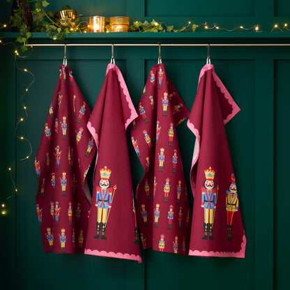 Catherine Lansfield Christmas Nutcracker Tea Towels (Pack of 4) - Plum